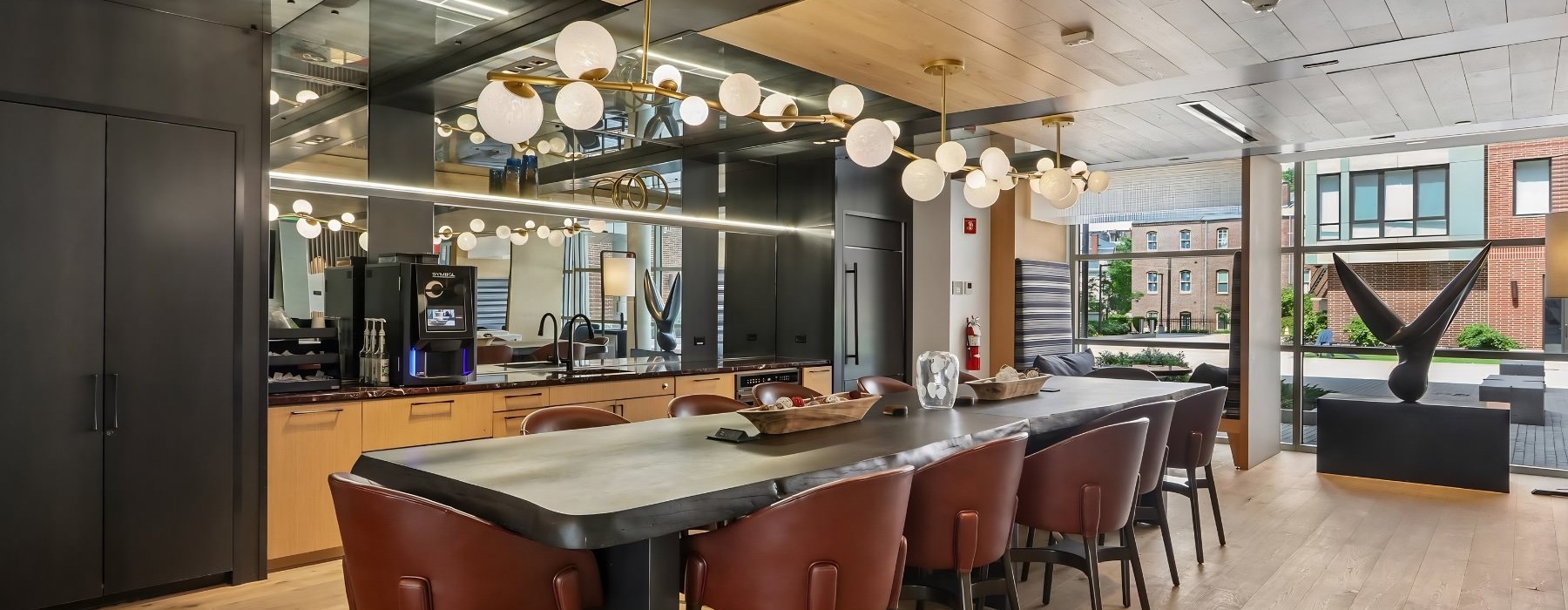 a clubroom with a table and chairs