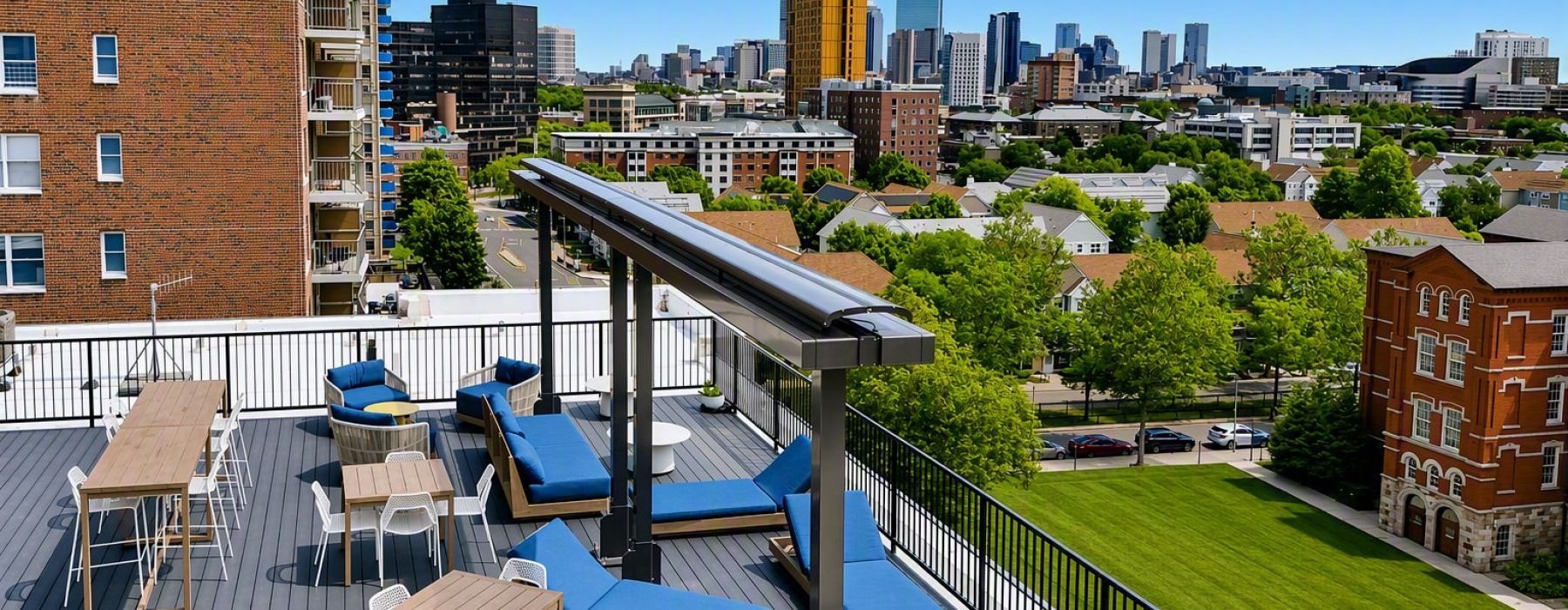 a rooftop courtyard with tables and chairs